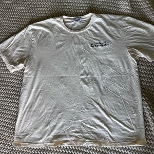 White Short Sleeve Crew Neck Tee with embroidered “do no harm but take no “sh*t”